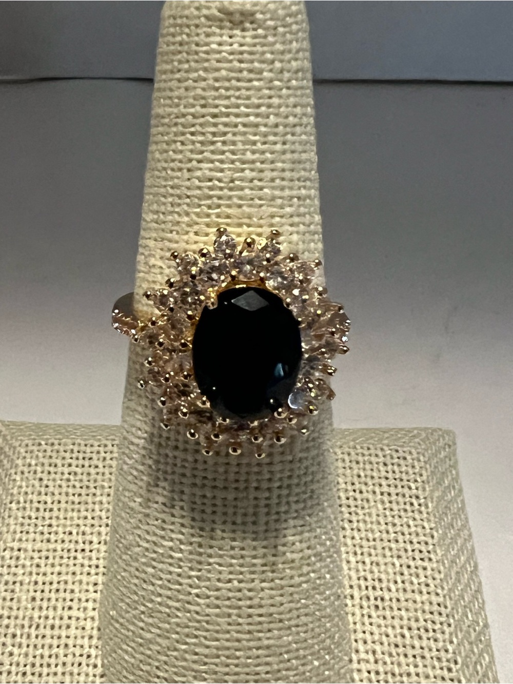 Gold Halo Ring with dark blue simulated sapphire Center Stone size 8